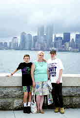 94-08-01, 05, Brian, Grandma, and Michael at Elis Island, NY