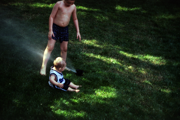 04-05-15, 13, Connor and Mikey in Sprinklers
